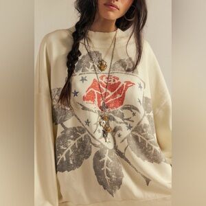 Free people we the free palm spring turtleneck graphic pullover sweatshirt